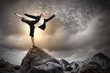 Photo: businesswoman standing atop of mountain businesswoman standing atop of mountain