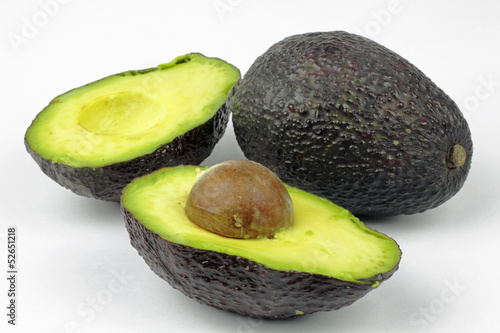 Photo: close up of avocado on the white background close up of avocado on the white background