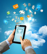 Close-up of hands holding tablet pc
