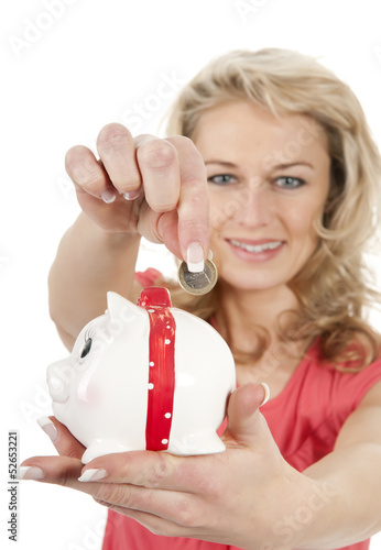 Photo: Frau mit Sparschwein Frau mit Sparschwein
