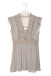 A grey blouse is on hanger.