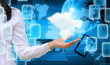 Photo: hand holding a cloud on technology background hand holding a cloud on technology background