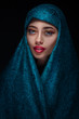Portrait of a beautiful woman in paranja