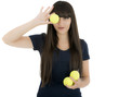 Woman tennis player holding a racket and balls, isolated on a wh