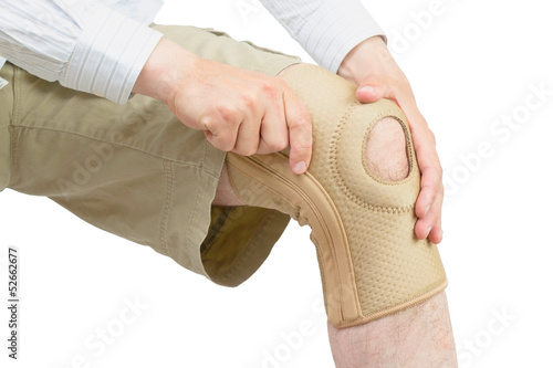 Photo: Neoprene knee brace. Neoprene knee brace.