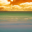 clouds and white sand at sunset