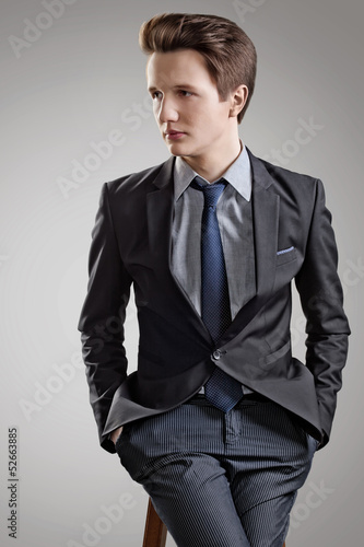 Photo: Short Hair Style. Portrait of young man with brown hair Short Hair Style. Portrait of young man with brown hair