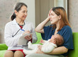 Woman tells doctor symptoms of newborn