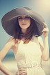 Redhead girl on the beack in spring time