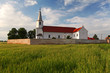Photo: Church and wheat field in Slovakia Church and wheat field in Slovakia