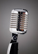 Classic microphone on grey