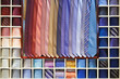 Ties collection on the shelf of a shop