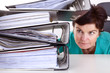 Woman looking at folders on the desk