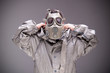 Photo: Man in protective mask on gray background Man in protective mask on gray background