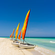 Colorful sailing boats on a cuban beach