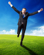happy business man running on spring field