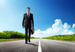 business man walking on the road