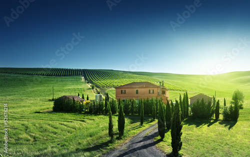 Photo: Tuscany landscape with typical farm house, Italty Tuscany landscape with typical farm house, Italty
