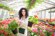 Woman holding flower pots
