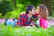young tender couple in spring park