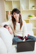 young asian woman using laptop