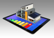 Smart  house with energy classification chat displayed on tablet