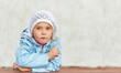 little girl in pink hat and jacket
