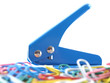 Puncher behind paper clips