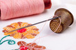 Photo: Old thimble and needle with thread Old thimble and needle with thread