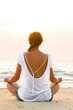 sitting on beach at sunrise