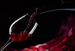 bottle and glass with red wine