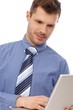 Photo: Young man using laptop Young man using laptop