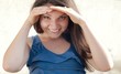 Happy young confident woman in blue blouse searching