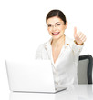Foto: Woman and laptop with thumbs up sign Woman and laptop with thumbs up sign