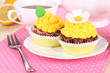 Beautiful lemon cupcakes on dining table close-up