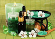 Spa composition with aroma oils on table close-up