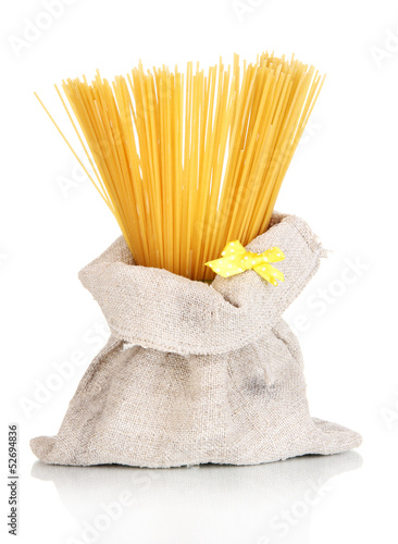 Photo: Pasta in bag isolated on white Pasta in bag isolated on white