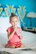 Photo: Little girl at hotel room Little girl at hotel room