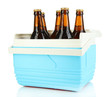Traveling refrigerator with beer bottles isolated on white