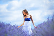 Woman standing on a lavender field