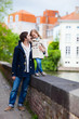 Father and daughter outdoors in a city