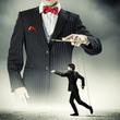 Businessman puppeteer