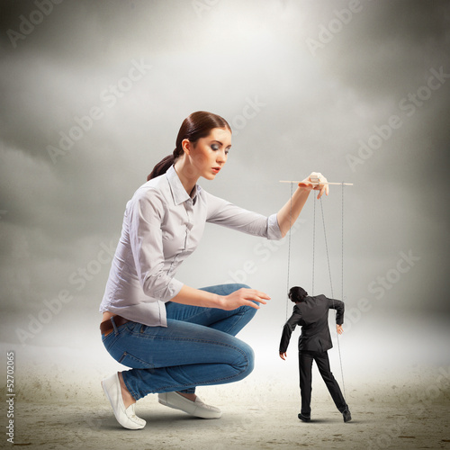 Photo: Businesswoman puppeteer Businesswoman puppeteer