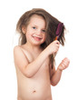 girl combs her hair