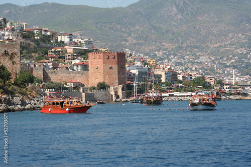 Photo: Alanya Harbor with Red Tower and Tourist Yachts Alanya Harbor with Red Tower and Tourist Yachts
