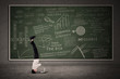 Photo: Businessman acrobatic move in classroom Businessman acrobatic move in classroom