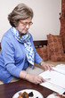 Senior Businesswoman about to Write