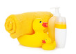 Rubber duck with bath towel and bottles