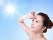 Photo: Beautiful woman face with sunshine and sky Beautiful woman face with sunshine and sky