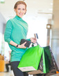 Foto: Shopping woman with color bags Shopping woman with color bags